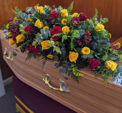 Red and Yellow funeral flowers 