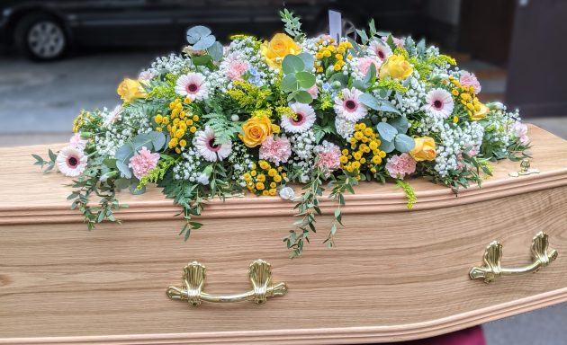 Pink and Yellow funeral flowers