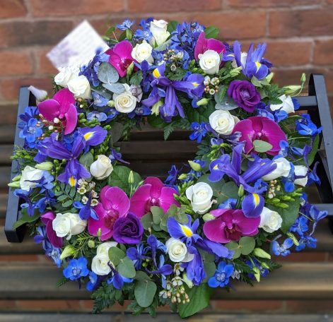 Vibrant purple funeral wreath 